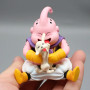 Figurine Dragon Ball Boo et son Chien dans une main